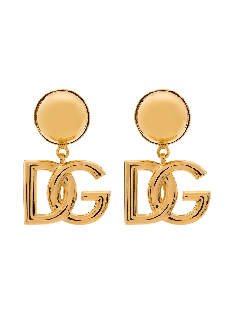 Pair of gold-tone clip-on earrings with a round disc and a DG logo drop