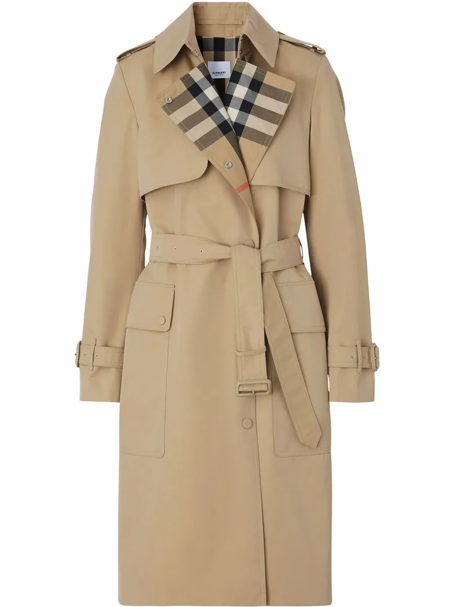 Beige double-breasted trench coat with a checked lapel and a belt, front view