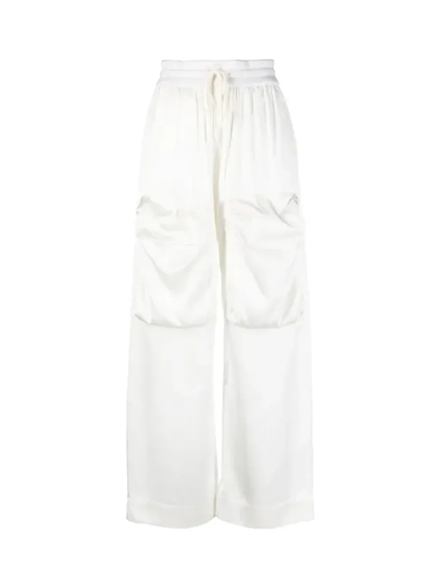 Off-white satin wide-leg trousers with a drawstring waist and two cargo pockets, front view