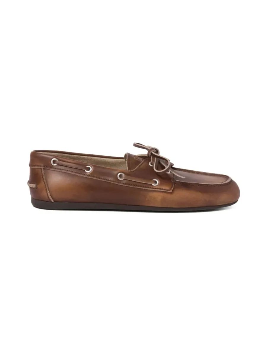 Brown bleached leather boat-style loafer with leather laces, side view
