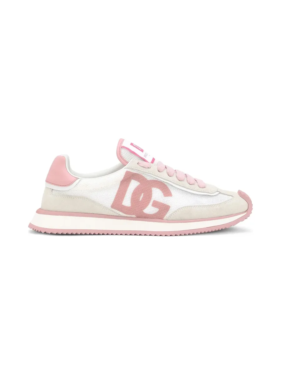 White and pink sneaker with a large DG logo on the side and a pink rubber sole, side view