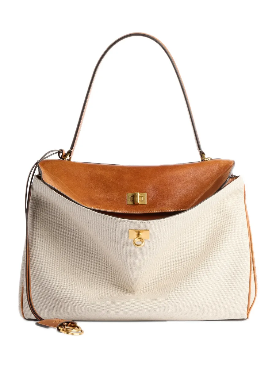 Beige Linen and Tan Leather Top-Handle Bag with an open flap and a turn lock, front view