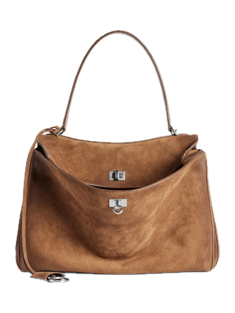 Camel Suede Top-Handle Bag with an open flap and a turn lock, front view