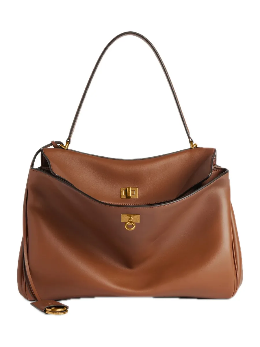 Tan Leather Top-Handle Bag with an open flap and a turn lock, front view
