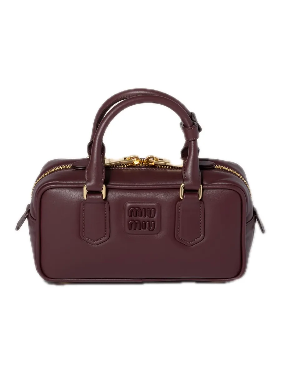 Burgundy padded leather top-handle bag, front view
