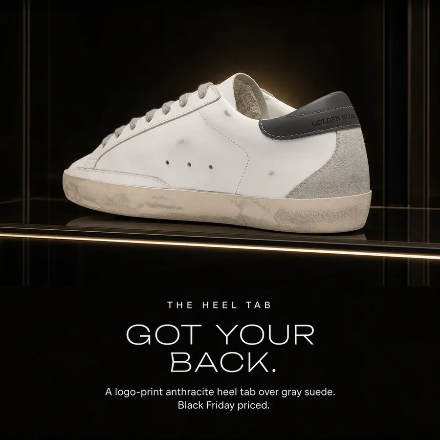 Got your back: a logo-print anthracite heel tab over gray suede on the Super-Star. Black Friday priced.