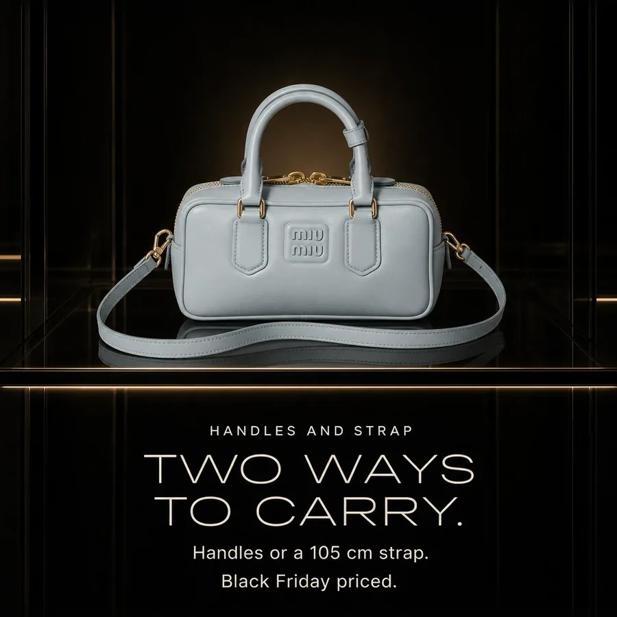 Two ways to carry: leather top handles or a detachable 105 cm strap, Black Friday priced.